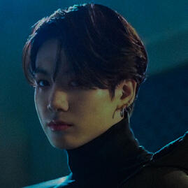 a cool-tinted picture of jungkook looking towards us, unaware of taehyung’s eyes on him. the image’s border is a circle.